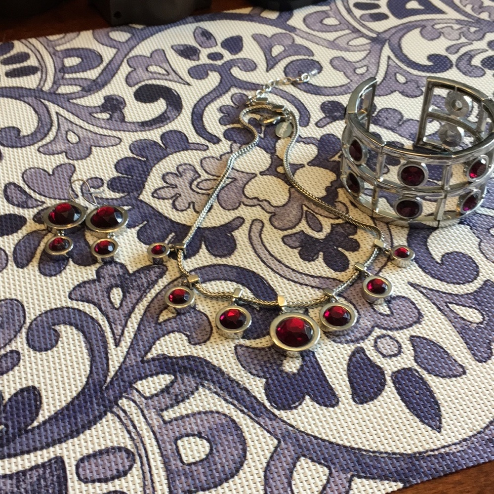 White House Black Market Jewelry 3 pc purple set.
